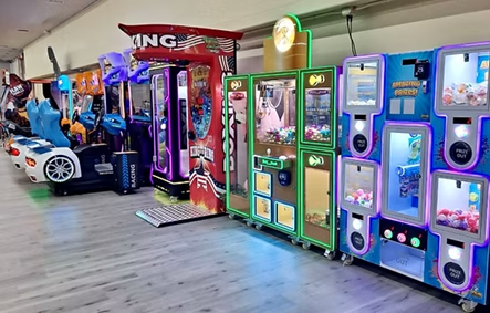 Arcade game machines and interactive play area at Willits Kids Corner